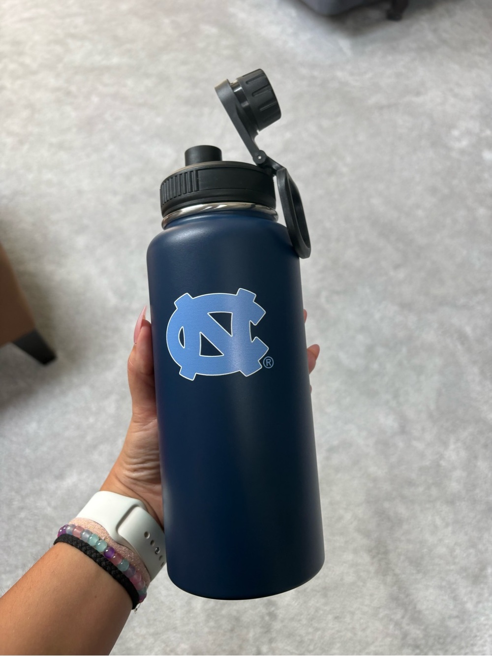 North Carolina Navy Stainless Steel Water Bottle with Light Blue Logo